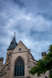 5th-arrondissement;-Bell-tower;-Church-of-Saint-Médard;-Clock;-Cross;-Flamboyant-Gothic;-Flamboyant-tracery;-France;-Gable;-Gothic-architecture;-Historic-monument;-Kaleidos;-Kaleidos-images;-La-parole-à-limage;-Low-angle;-Mouffetard-district;-Oculus;-Paris;-Places-of-worship;-Religious-heritage;-Rue-Mouffetard;-Spire;-Stories-Pictures;-Stormy-sky;-Tarek-Charara;-Weathervane